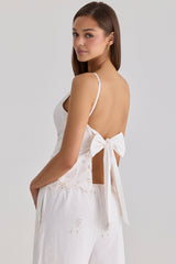 white broderie anglaise cotton bow back top